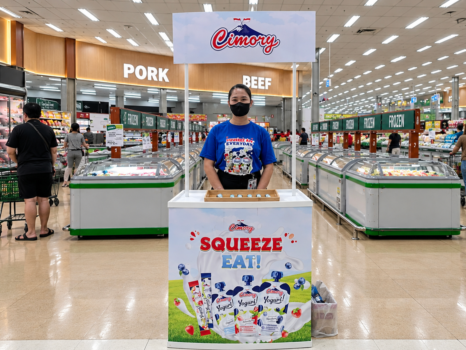 Brand ambassador at a Cimory Squeeze booth sampling product in a supermarket aisle